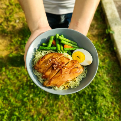 Image of delicious Hong-Kong Style Glazed Chicken Noodles served with long bean and hard-boiled egg